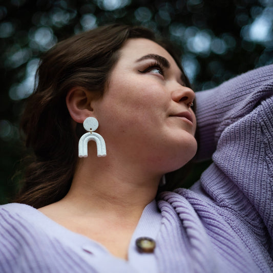 Alina Arch Earring shown being worn on ear