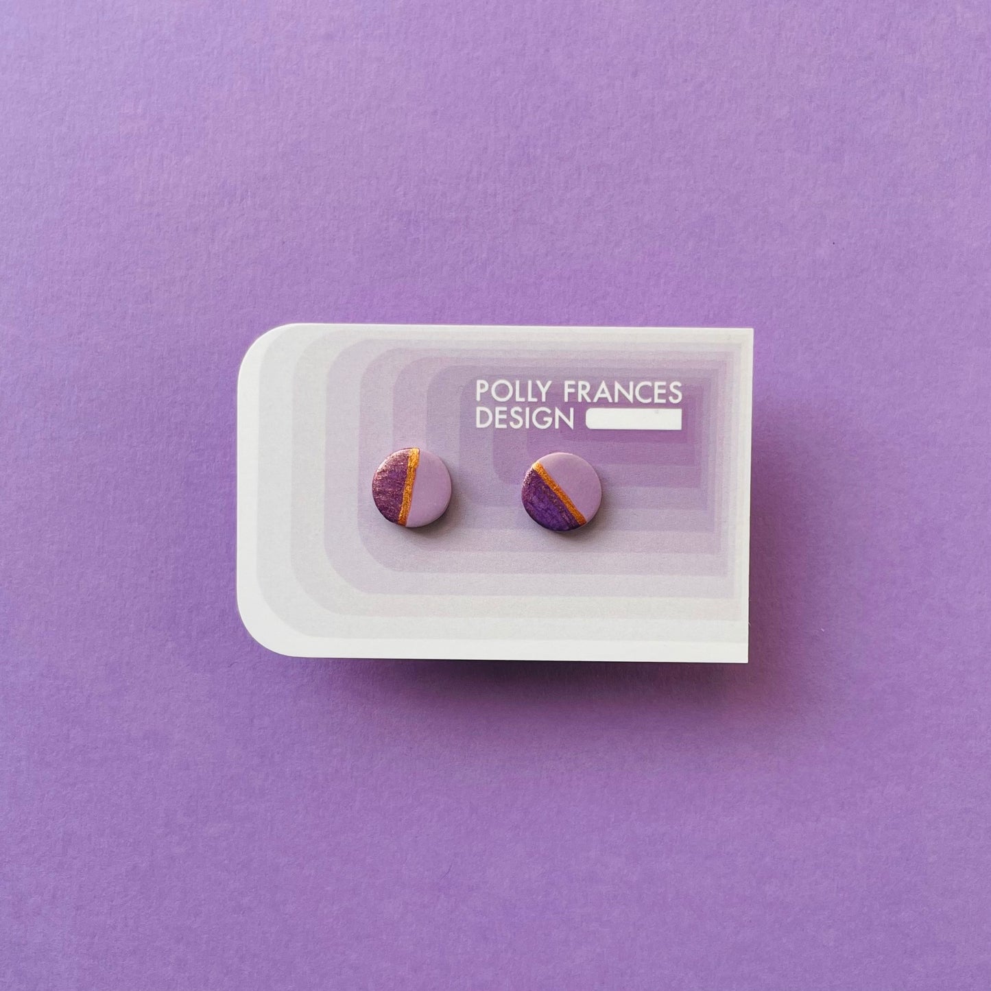 Purple & Gold Studs Sitting On Branded Polly Frances Design Card