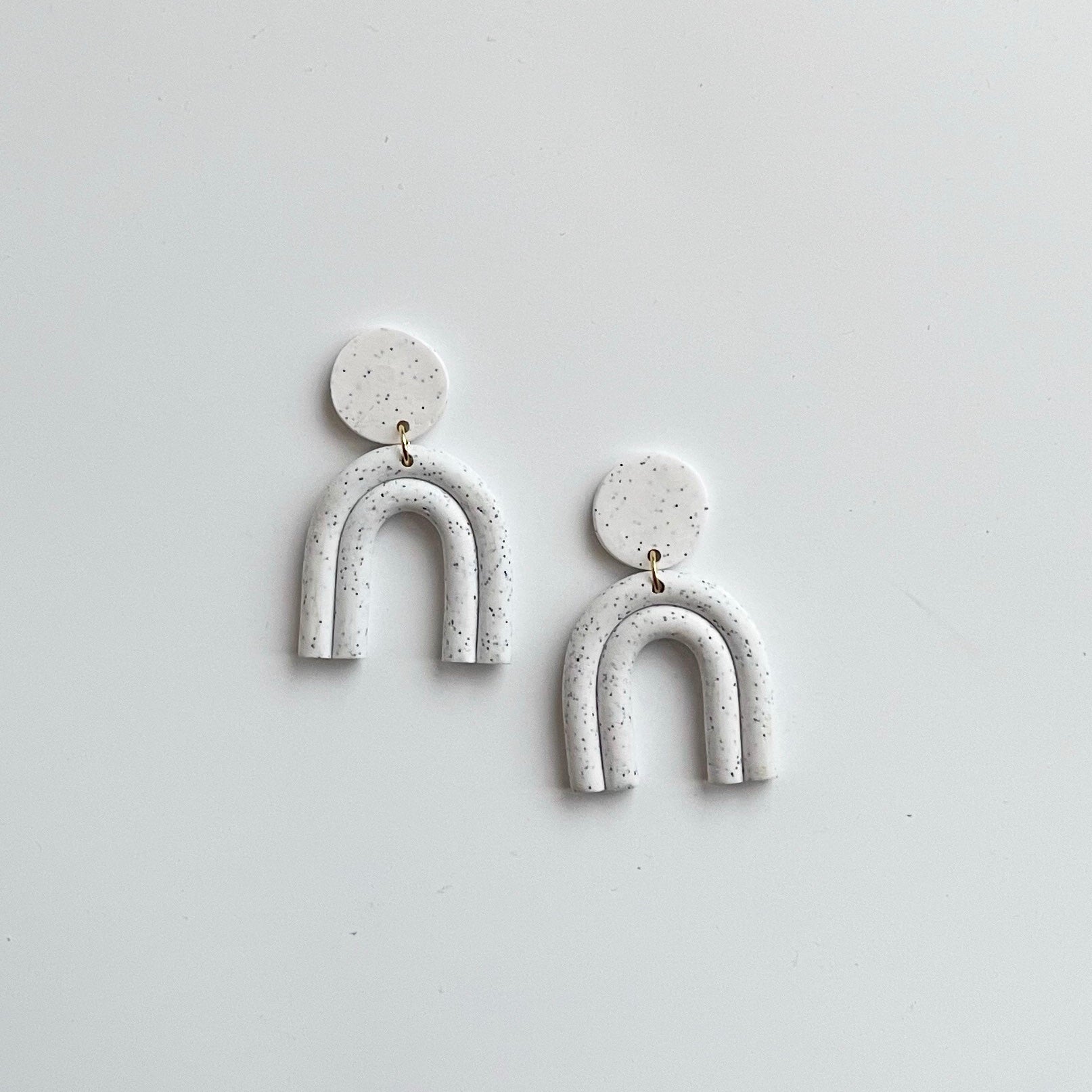 Alina Arch Polymer Clay Earring in Speckled White Colour