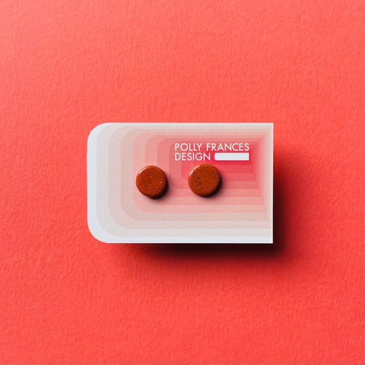 Rust Granite Studs Sitting On Branded Polly Frances Design Card